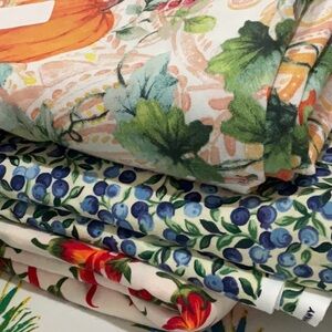 Fabric. 8 yards pumpkins, peppers and blueberries. Never used.